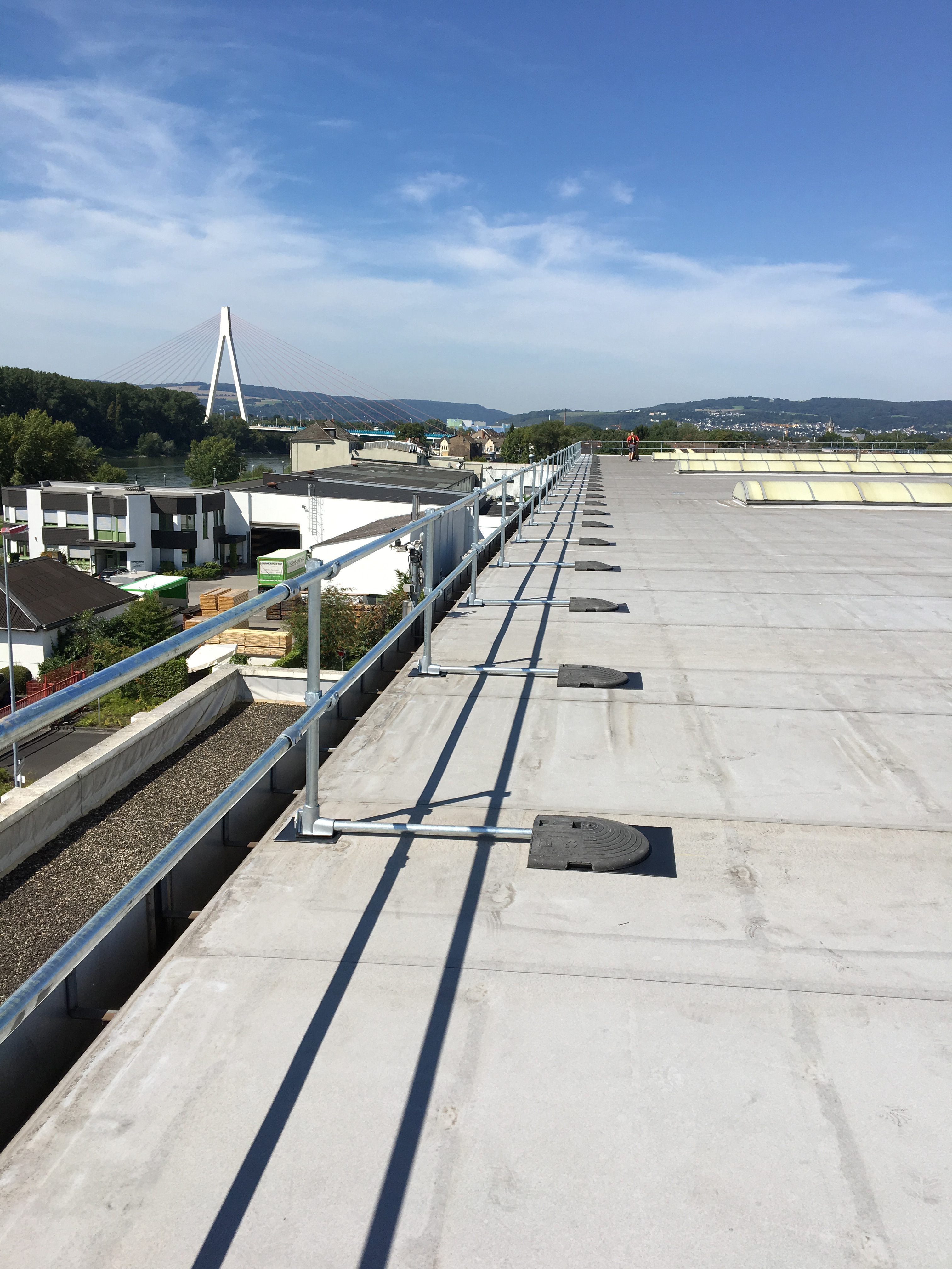 Kee Guard's free-standing roof safety railing system doesn't impact the waterproofing of roof 